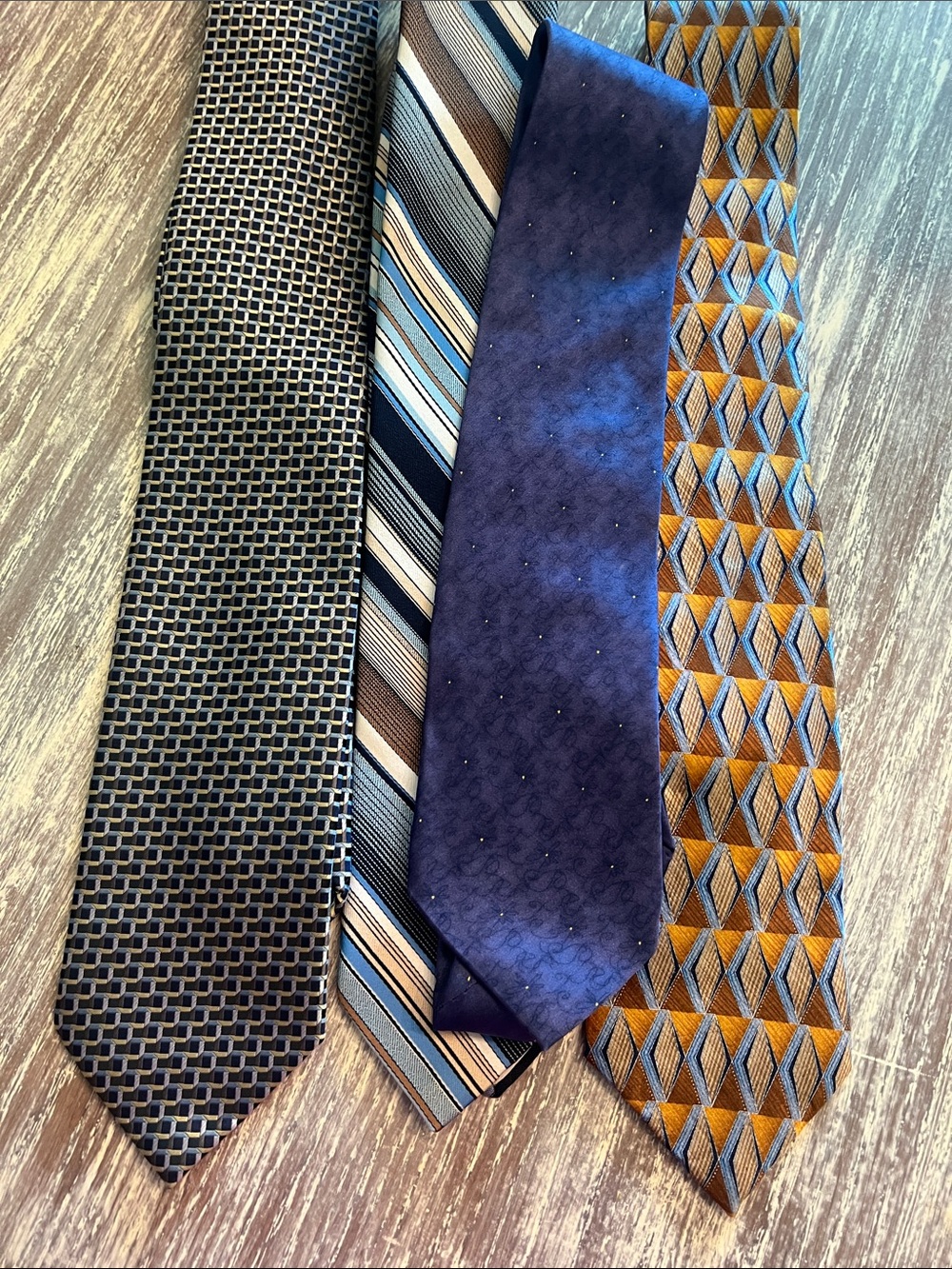 Assorted Men's Blue Patterned Silk and Polyester Ties. Set of 4